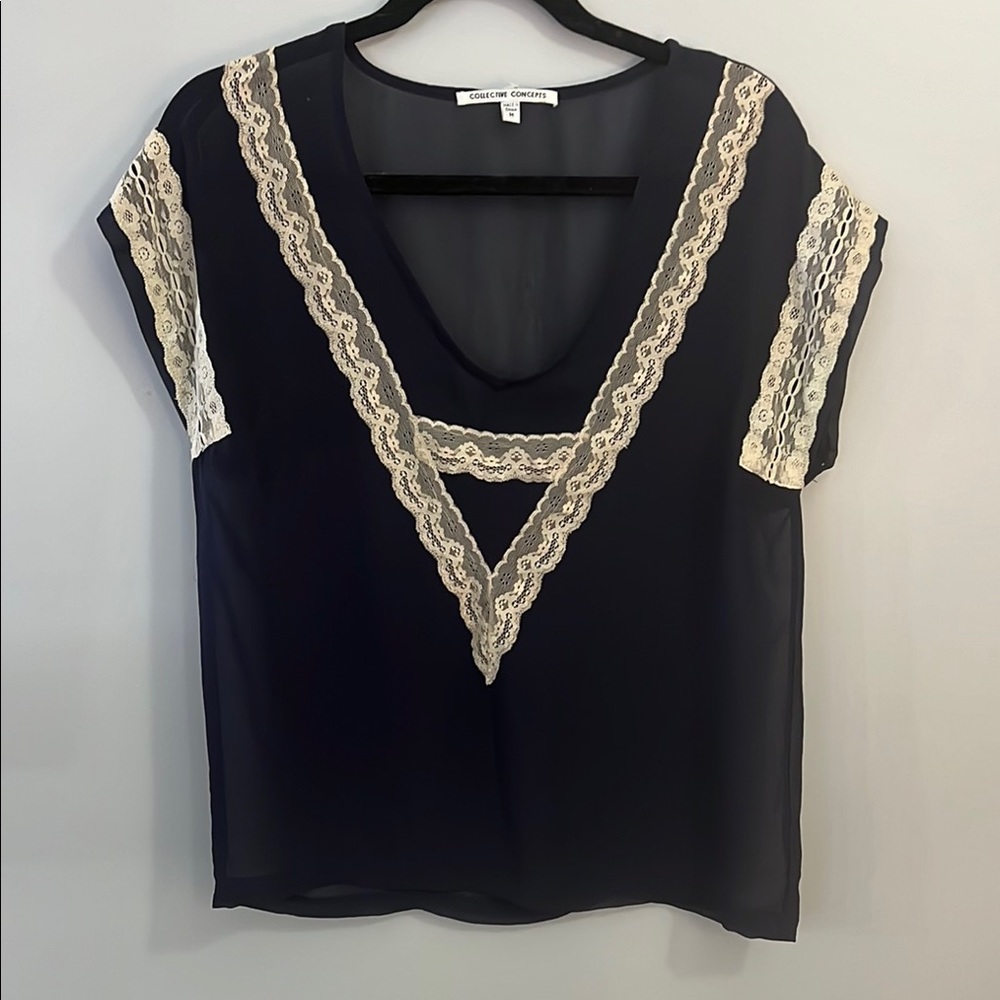 Navy blouse with V-neck short sleeves and lace trim